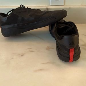 I’m selling these Prada Adidas collaboration shoes. They are black and size 13.